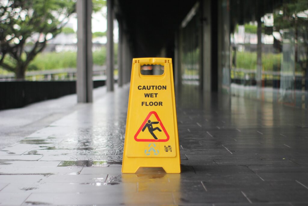 yellow wet floor sign